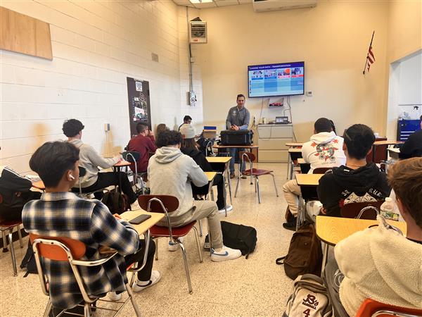 Vocational students listen to the UTI representative to hear all the exciting choices for their future. 